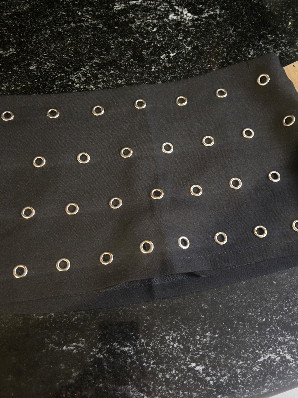 Black Eyelet Mini Skirt with Metallic Accents